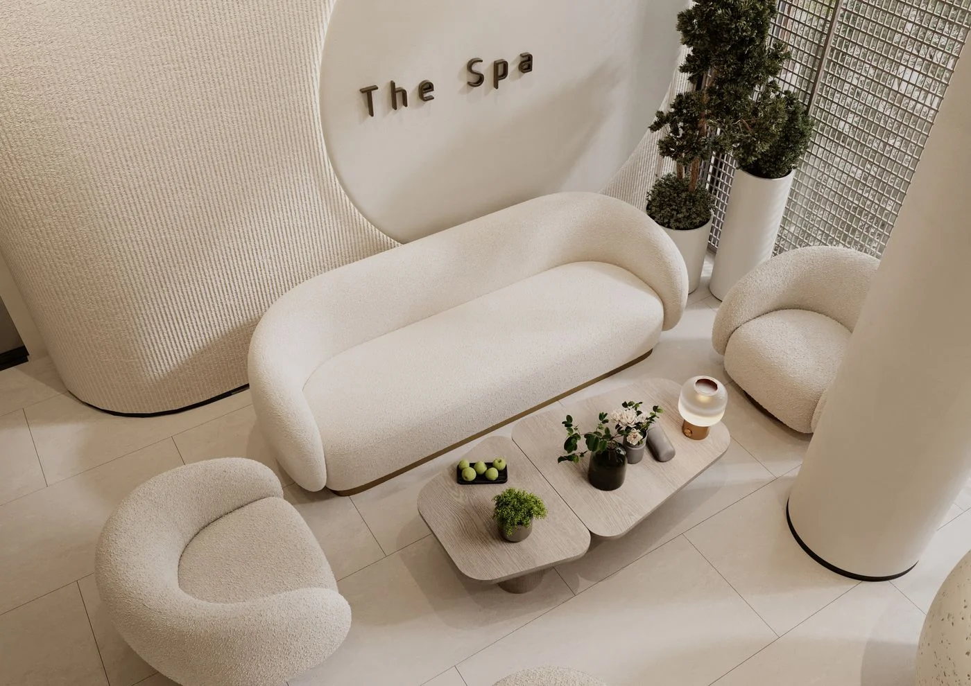 Quiet spa reception lounge with sculptural cream seating